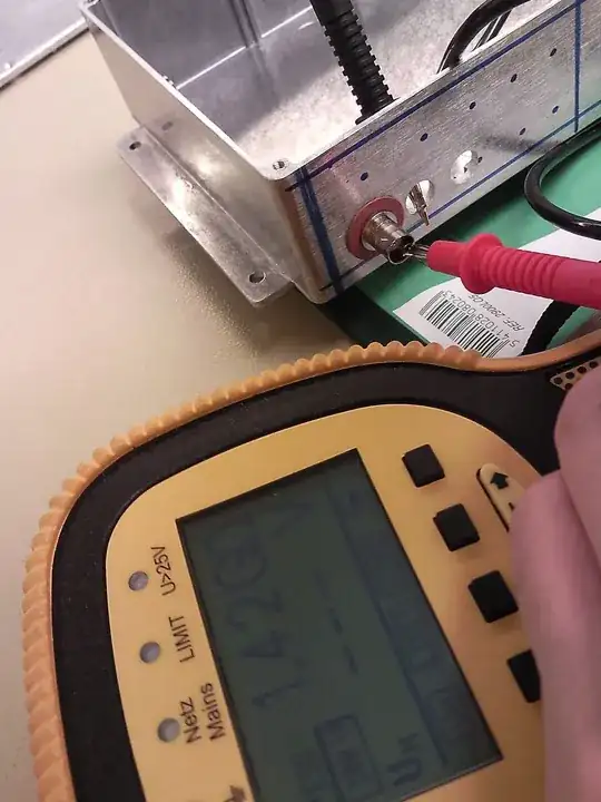 Floating laptop connected to speaker with voltage divider