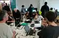Carré central mapathon et coin OSM au fond
