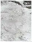 A fumarole beneath a  mud pool, which causes the mud to boil and bubble. If it is producing water, use hot_spring. If it is only producing steam/gas, use fumarole.