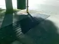 Australian bus stop showing two different tactile patterns.
