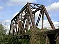 Warren-type simple truss bridge of the former Seaboard Air Line Railway.