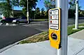 Canada:Tactile arrow on a call button