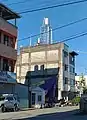 Cell tower mimicking water tank