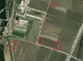 5/5 Power pylon (power=tower) and power poles visible due to their thin and long shadows (Maxar satellite imagery).