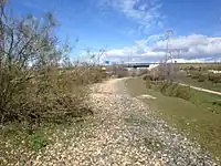Ballast remaining as a recognizable marker of a railway line