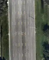 United States:lanes=8lanes:forward=3lanes:backward=3lanes:reversible=2(Reversible lanes are marked by double yellow dashes.)