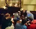 London OpenStreetMap pub meet-up with a small wood burner in the background