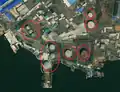 1/4 Storage tank (man_made=storage_tank) near a water area (Maxar satellite imagery).