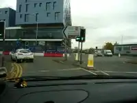 Traffic island at a Junction.  Without tactile paving, but has a lowered kerb.