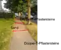 Unterschiedliche Oberfläche auf einem Gehwegabschnitt