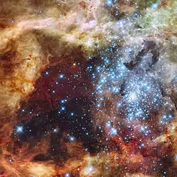 Grand star-forming region R136 in NGC 2070 (visible and ultraviolet, captured by the Hubble Space Telescope).jpg